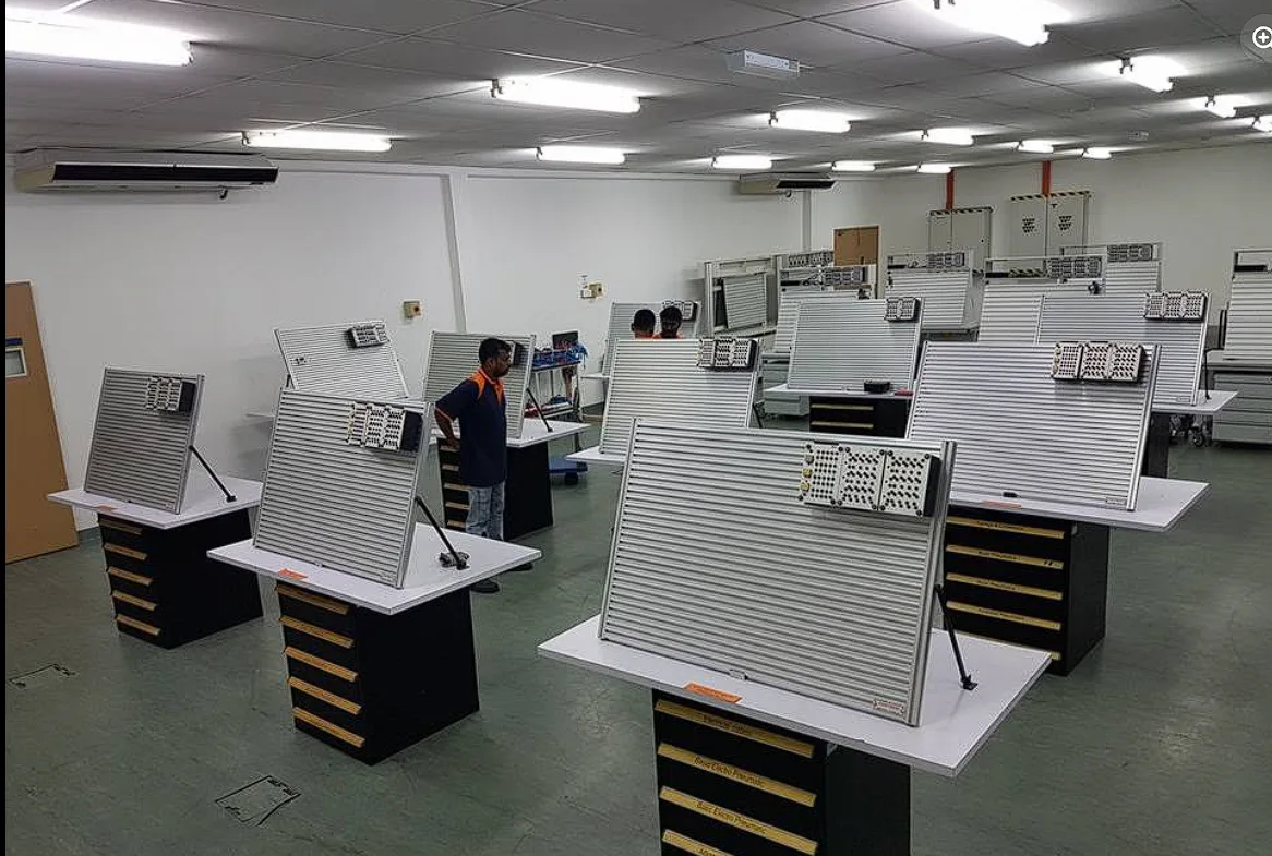 Rows of training workstations installed in a refurbished lab after a move