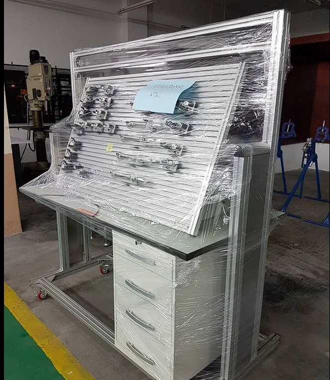 Training workstation with tool panel shrink-wrapped for moving